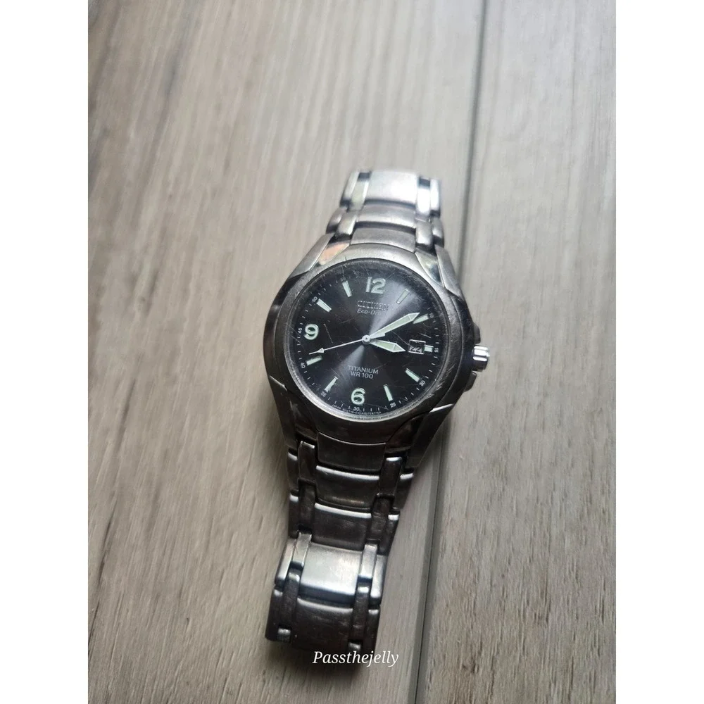 Citizen Watch Mens Eco-Drive Titanium WR100 Black Dial Date Bracelet Field Watch